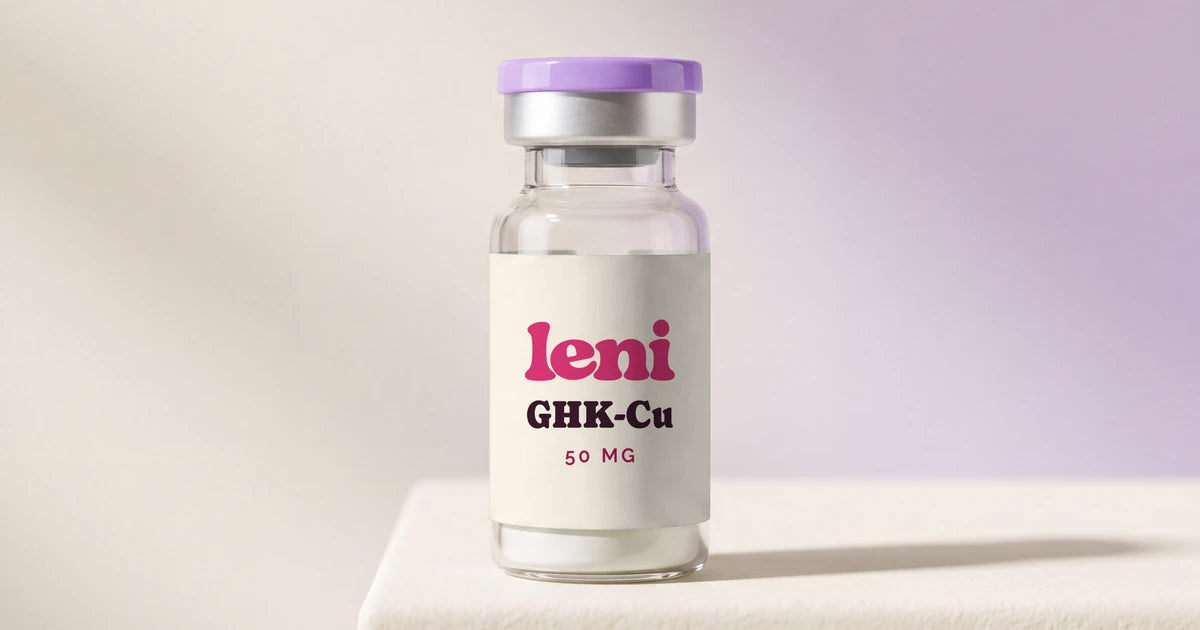 A Leni GHK-Cu vial on a cream plinth against a cream and lilac backdrop.